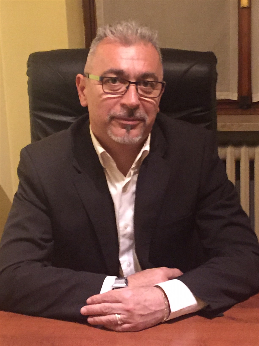 Dr. Flavio Greggio
